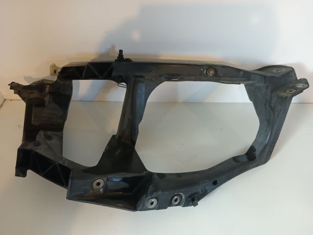 bontott MITSUBISHI COLT Bal Fényszóró Tartó