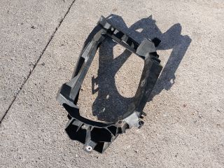 bontott MITSUBISHI COLT Bal Fényszóró Tartó