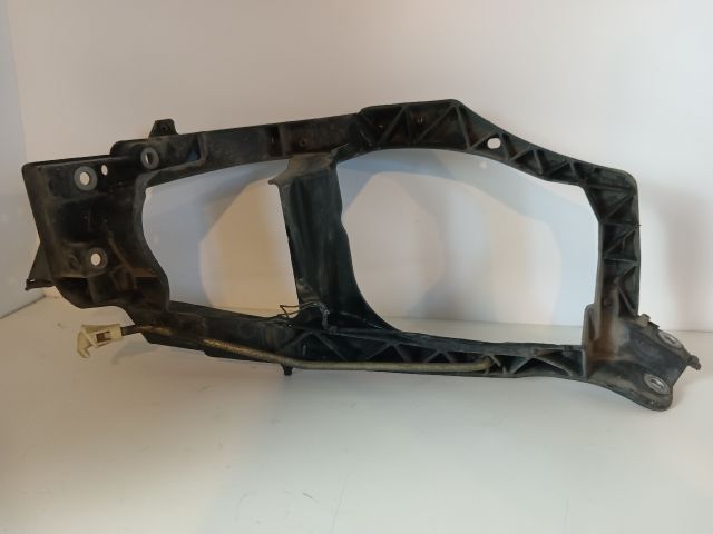 bontott MITSUBISHI COLT Bal Fényszóró Tartó