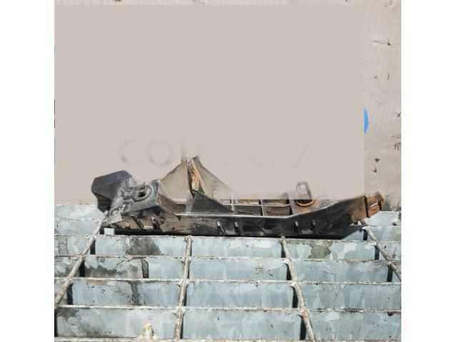 bontott MITSUBISHI L 200 Bal Fényszóró Tartó