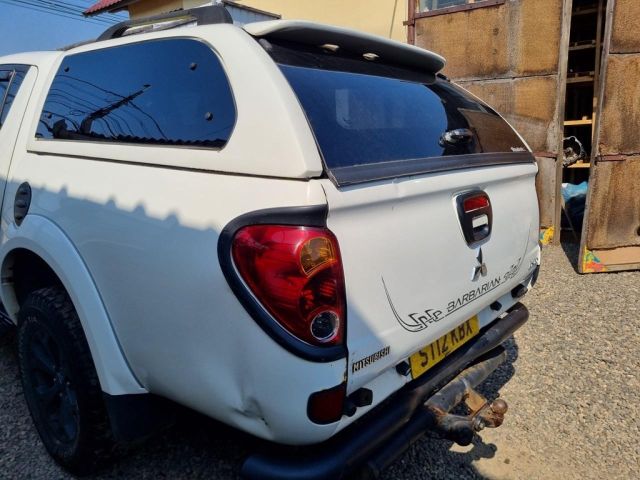 bontott MITSUBISHI L 200 Hátsó Lökhárító (Üresen)