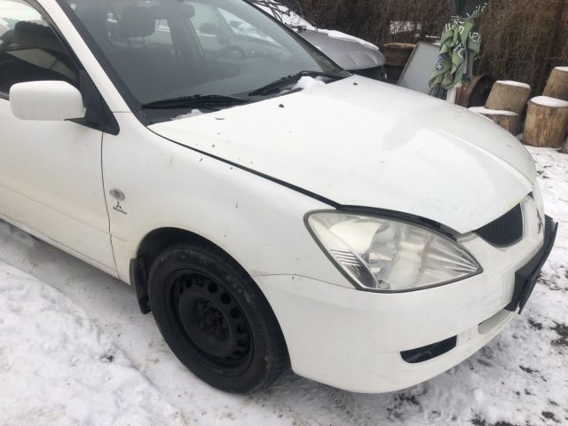 bontott MITSUBISHI LANCER Bal hátsó Hosszlengőkar