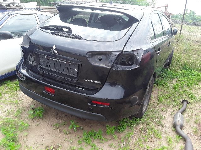 bontott MITSUBISHI LANCER Bal első Kerékagy