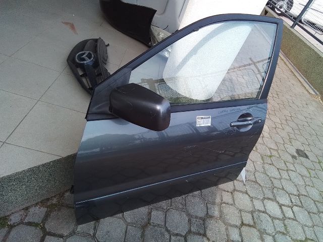 bontott MITSUBISHI LANCER Bal első Ajtó (Részeivel)