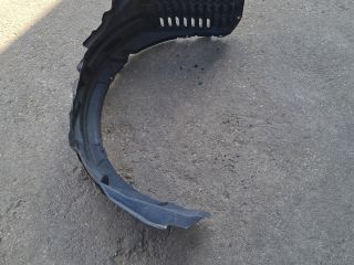 bontott MITSUBISHI LANCER Bal első Dobbetét (Kerékjárati, Műanyag)