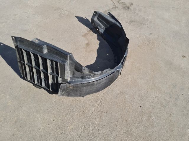 bontott MITSUBISHI LANCER Bal első Dobbetét (Kerékjárati, Műanyag)