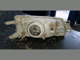 bontott MITSUBISHI LANCER Bal Fényszóró