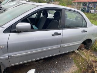 bontott MITSUBISHI LANCER Bal hátsó Ablak