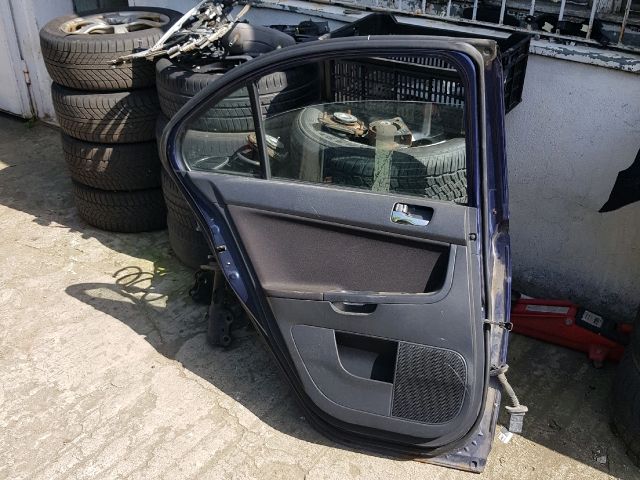 bontott MITSUBISHI LANCER Bal hátsó Ajtó (Részeivel)