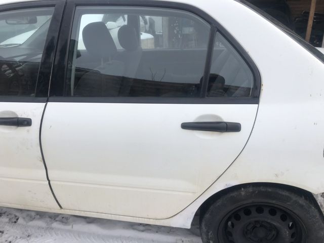 bontott MITSUBISHI LANCER Bal hátsó Gólyaláb (Lengécsillapító, Rugó)