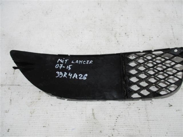 bontott MITSUBISHI LANCER Bal Ködzárófény Keret