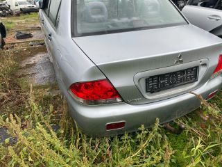 bontott MITSUBISHI LANCER Csomagtérajtó (Üres lemez)