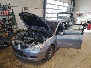 bontott MITSUBISHI LANCER Csomagtérajtó Zárszerkezet