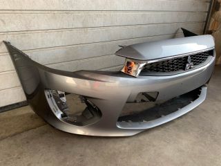bontott MITSUBISHI LANCER Első Lökhárító (Üresen)