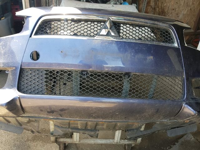 bontott MITSUBISHI LANCER Első Lökhárító (Üresen)