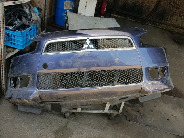 bontott MITSUBISHI LANCER Első Lökhárító (Üresen)