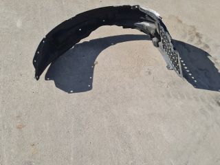 bontott MITSUBISHI LANCER Jobb első Dobbetét (Kerékjárati, Műanyag)