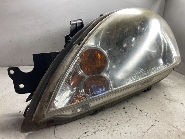 bontott MITSUBISHI LANCER VII Bal Fényszóró