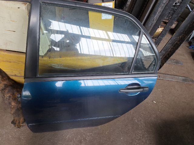 bontott MITSUBISHI LANCER VII Bal hátsó Ajtó (Részeivel)