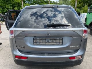 bontott MITSUBISHI OUTLANDER Bal hátsó Dobbetét (Kerékjárati, Műanyag)