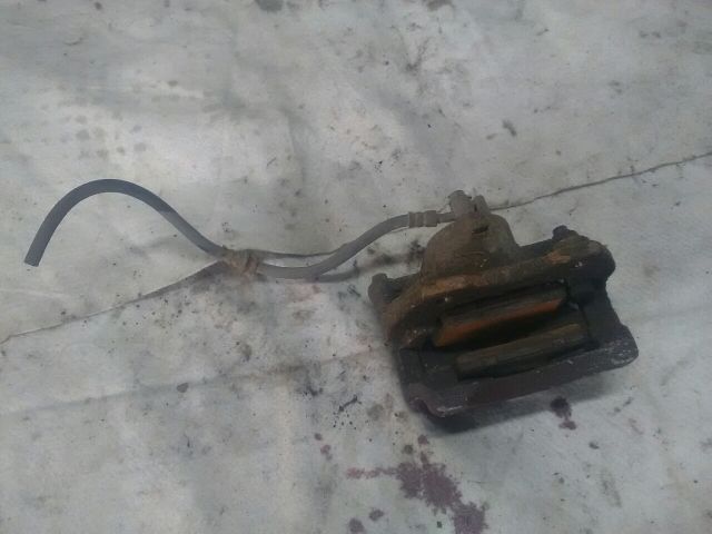 bontott NISSAN ALMERA II Bal első Féknyereg Munkahengerrel