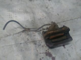 bontott NISSAN ALMERA II Bal első Féknyereg Munkahengerrel