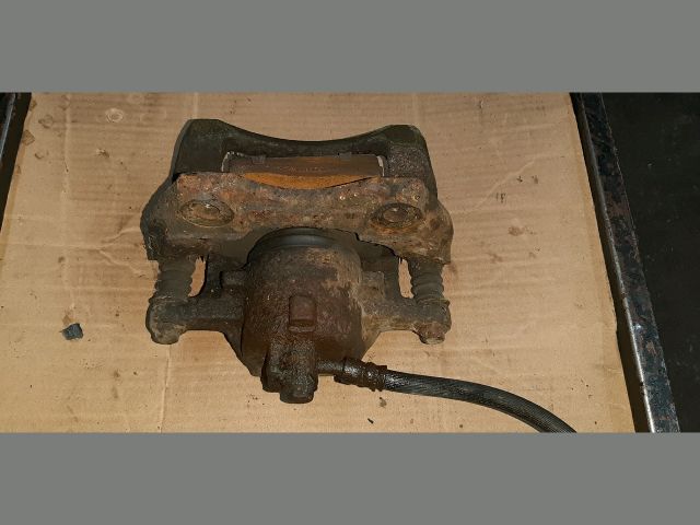 bontott NISSAN ALMERA II Bal első Féknyereg Munkahengerrel