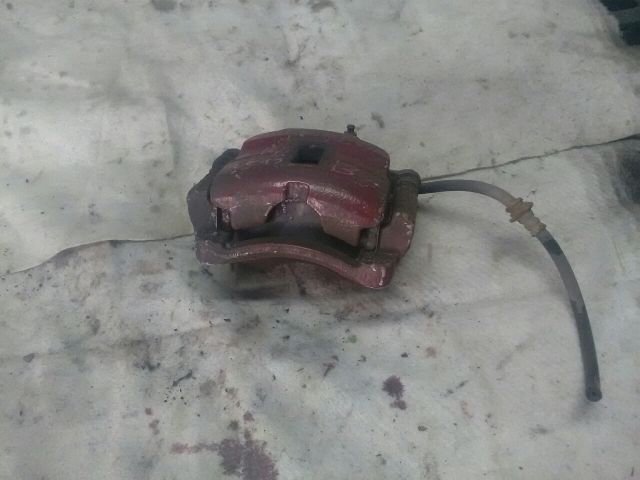 bontott NISSAN ALMERA II Bal első Féknyereg Munkahengerrel