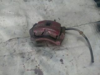 bontott NISSAN ALMERA II Bal első Féknyereg Munkahengerrel