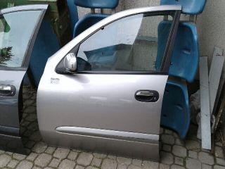 bontott NISSAN ALMERA II Bal első Ajtó (Részeivel)