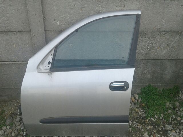 bontott NISSAN ALMERA II Bal első Ajtó (Részeivel)