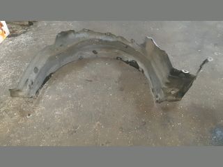 bontott NISSAN ALMERA II Bal első Dobbetét (Kerékjárati, Műanyag)