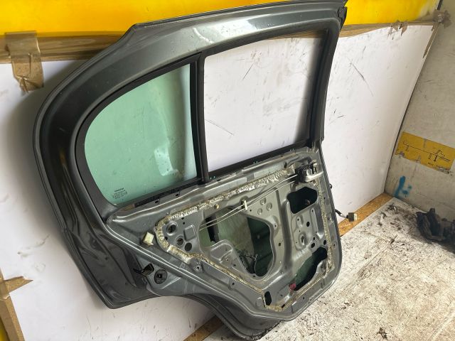 bontott NISSAN ALMERA II Bal hátsó Ajtó (Üres lemez)