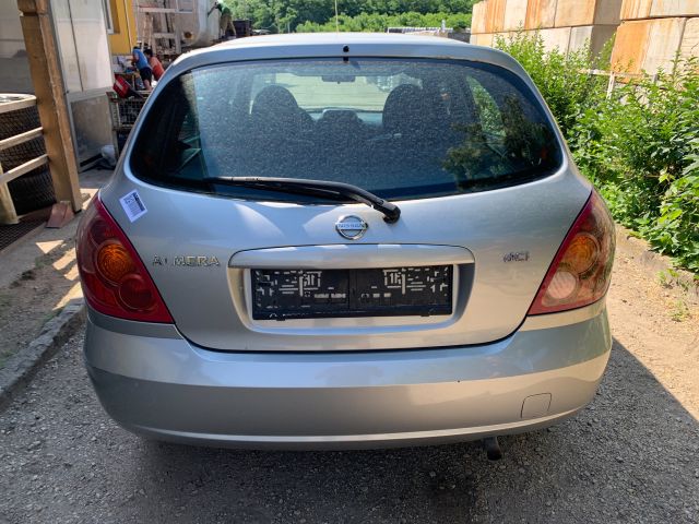 bontott NISSAN ALMERA II Bal hátsó Dobbetét (Kerékjárati, Műanyag)