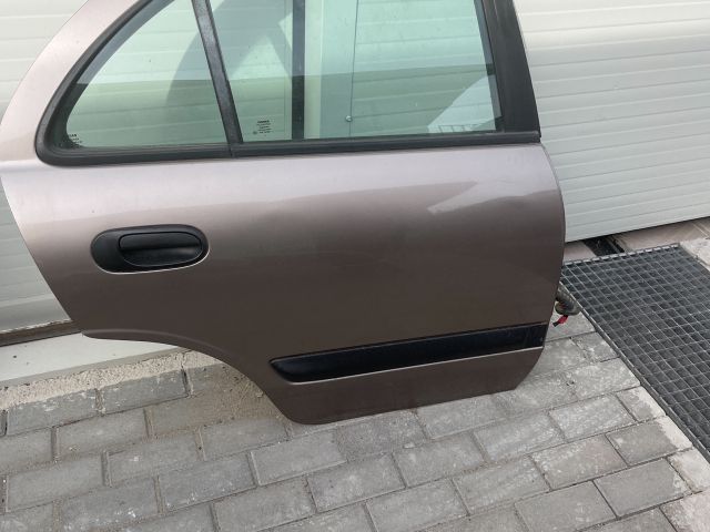 bontott NISSAN ALMERA II Jobb hátsó Ajtó (Üres lemez)