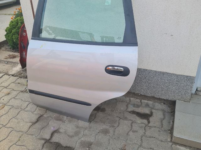 bontott NISSAN ALMERA TINO Bal hátsó Ajtó (Üres lemez)