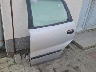 bontott NISSAN ALMERA TINO Bal hátsó Ajtó (Üres lemez)