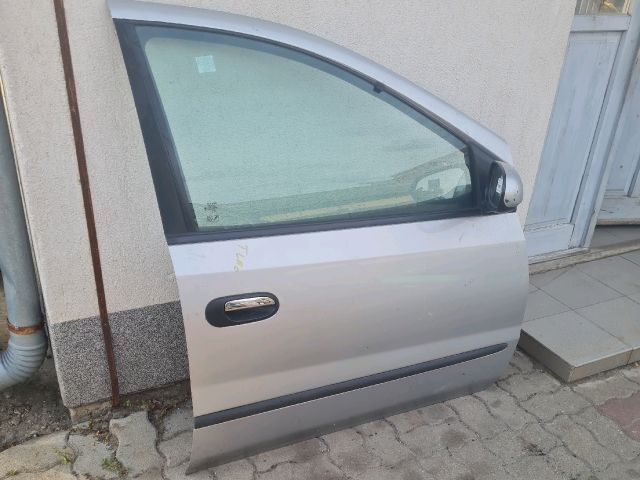 bontott NISSAN ALMERA TINO Jobb első Ajtó (Üres lemez)