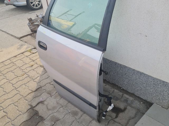 bontott NISSAN ALMERA TINO Jobb hátsó Ajtó (Üres lemez)