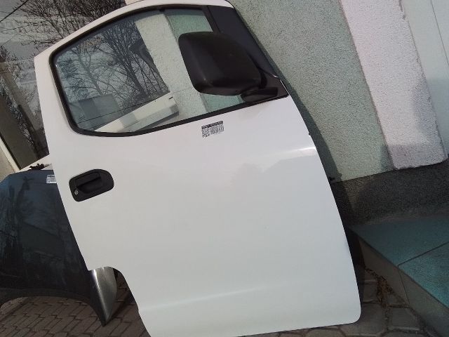 bontott NISSAN NV200 Jobb első Ajtó (Üres lemez)