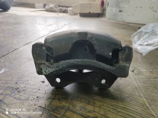 bontott NISSAN PRIMERA Bal első Féknyereg Munkahengerrel