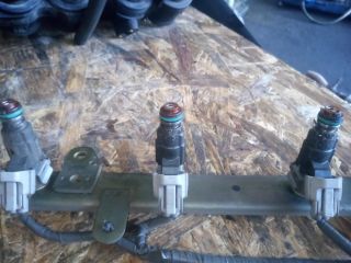 bontott NISSAN PRIMERA Porlasztó Sor / Híd