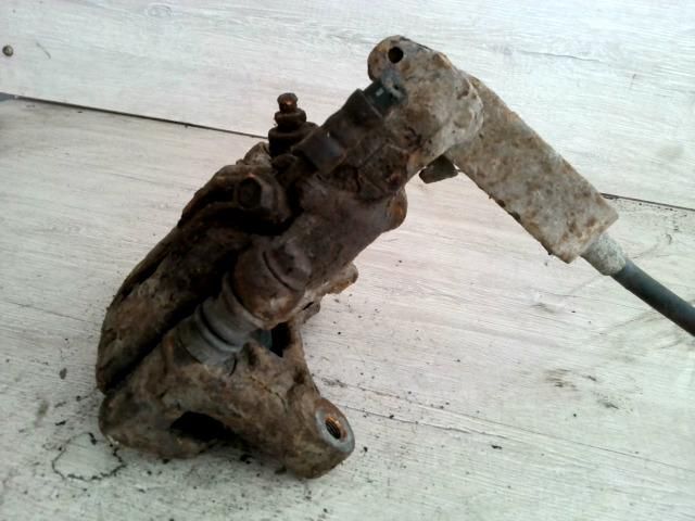 bontott NISSAN PRIMERA Bal hátsó Féknyereg Munkahengerrel