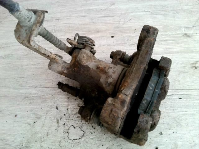 bontott NISSAN PRIMERA Bal hátsó Féknyereg Munkahengerrel