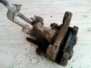 bontott NISSAN PRIMERA Bal hátsó Féknyereg Munkahengerrel