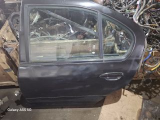 bontott NISSAN PRIMERA Bal hátsó Ajtó (Részeivel)