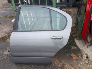 bontott NISSAN PRIMERA Bal hátsó Ajtó (Részeivel)