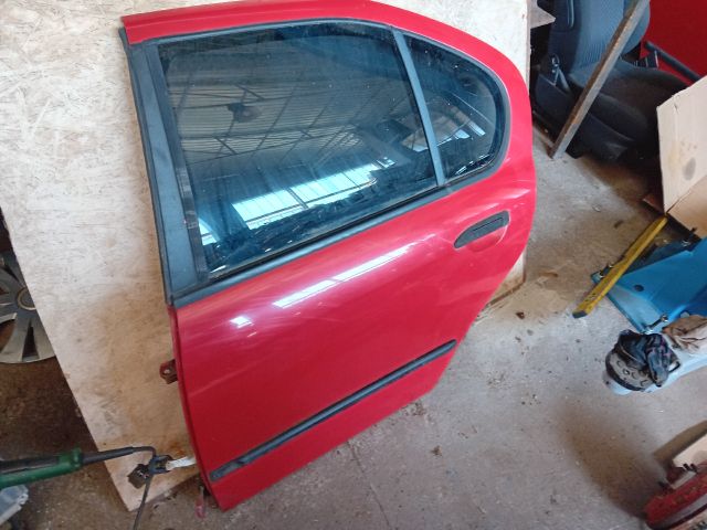 bontott NISSAN PRIMERA Bal hátsó Ajtó (Részeivel)