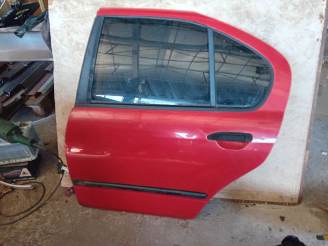 bontott NISSAN PRIMERA Bal hátsó Ajtó (Részeivel)