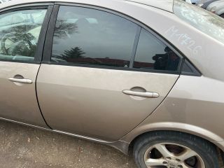 bontott NISSAN PRIMERA Bal hátsó Ajtó (Üres lemez)